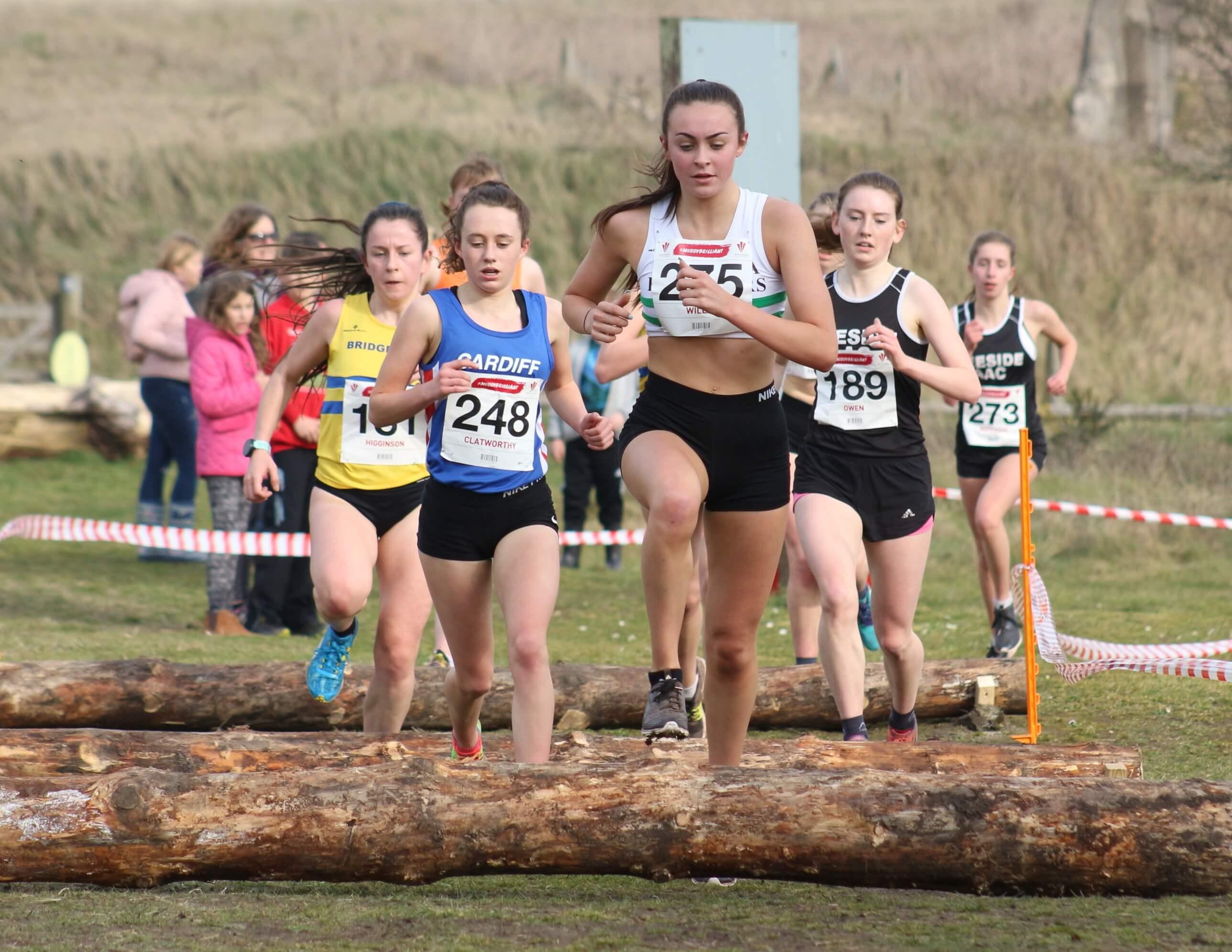 Swansea Harrier Ashleigh Willis  negotiates the log barriers on her way to victory in the women's  under-17-under-20 race..jpg