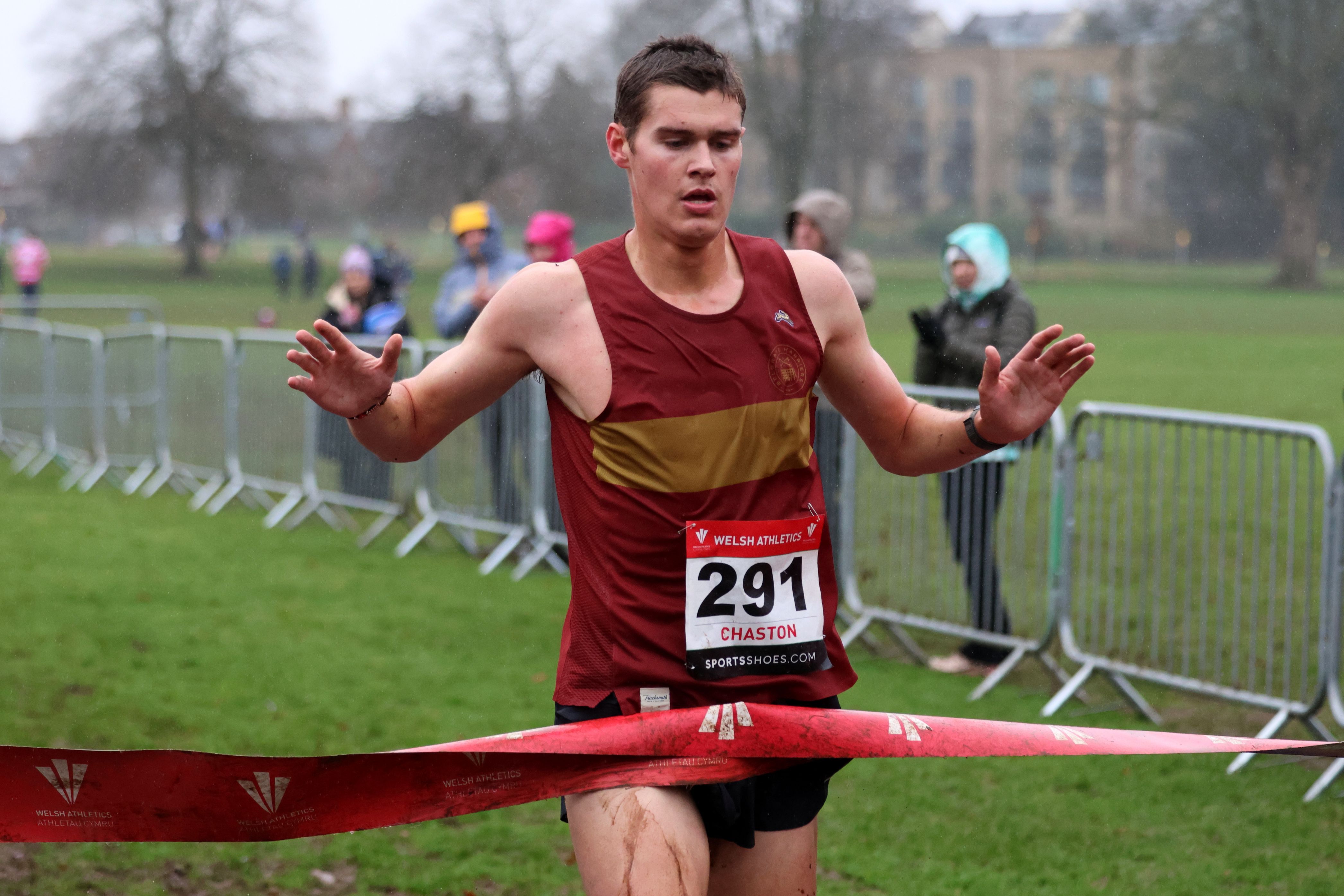 Thomas Chaston takes the tape to win the senior men's title..jpg