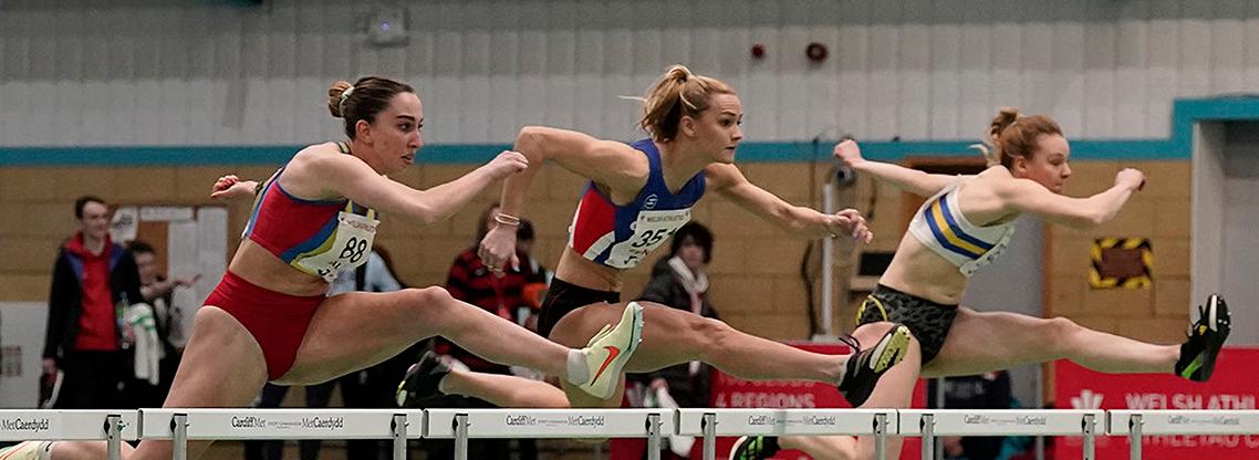 Lauren Evans competing in the hurdles.